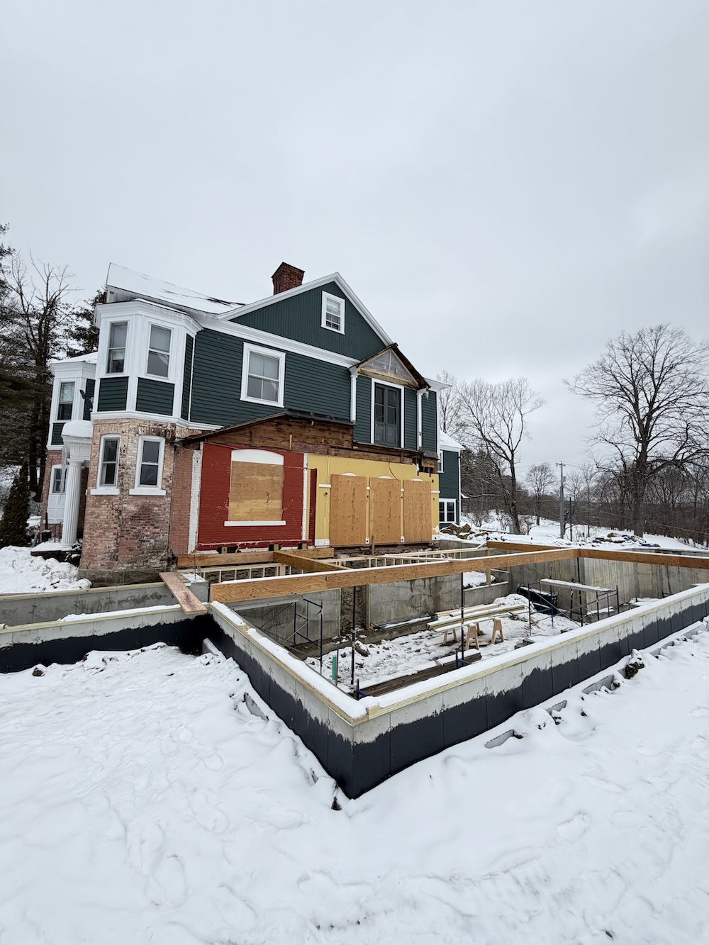 The new foundation dug and poured on the south side of the Main House